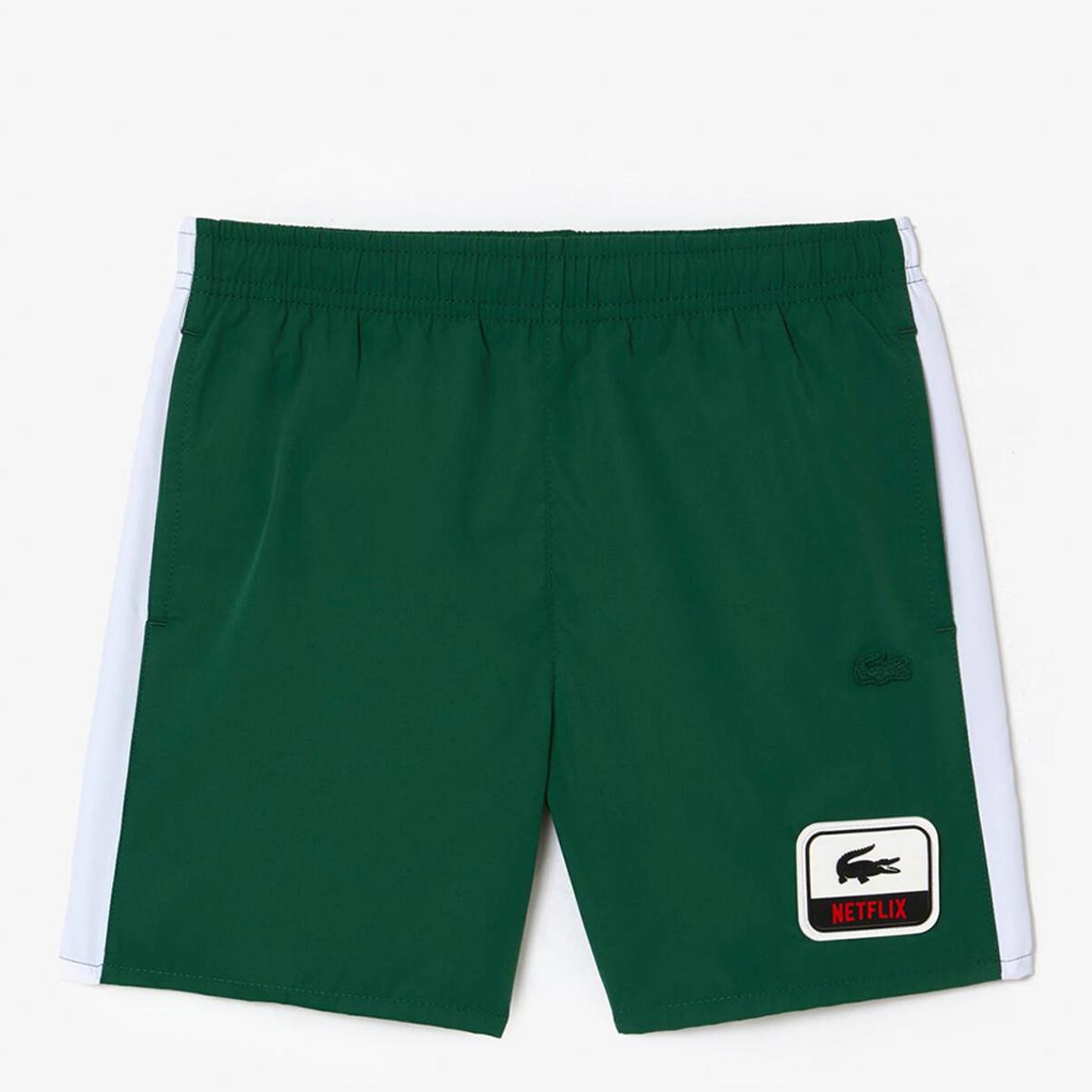 Teen Boy's Dark Green Side Stripe Swimming Trunks main product photo