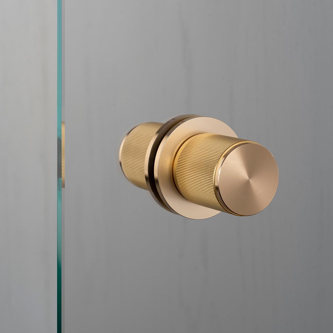 Fixed Linear Door Knob in Brass, Double-sided main product photo