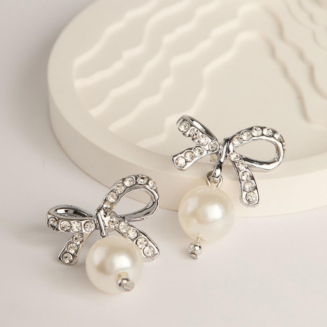 Silver and Pearl Bow Earrings main product photo