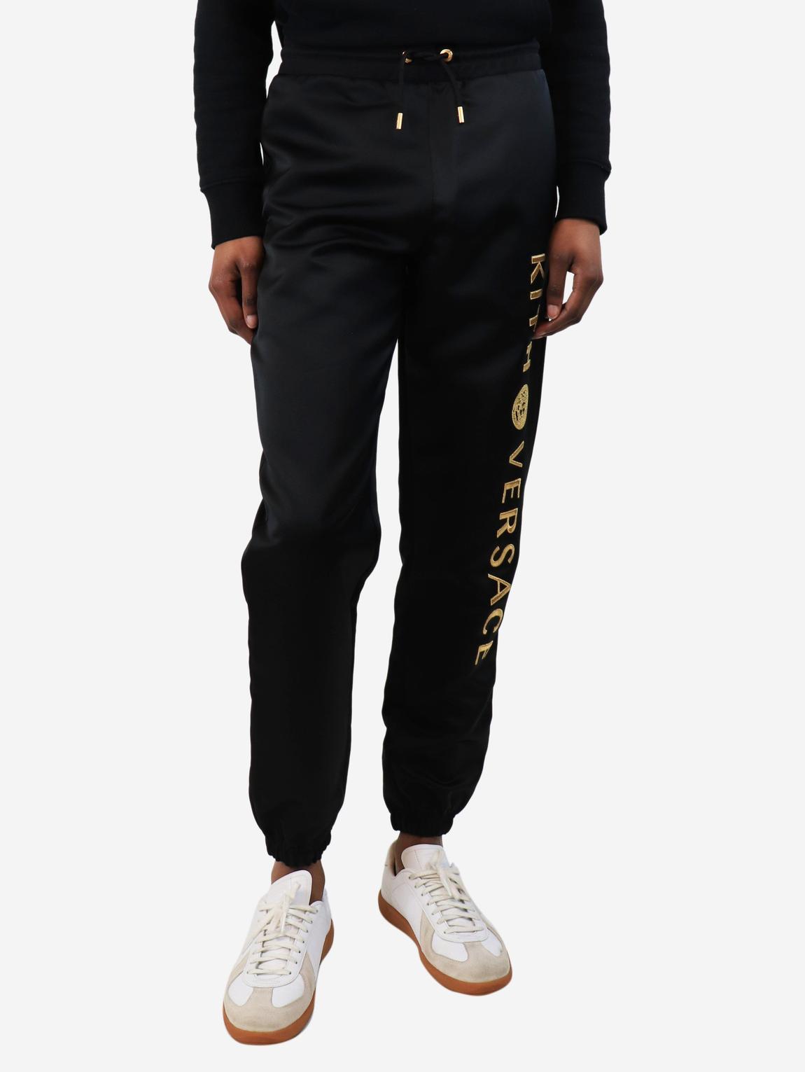 Gold embroidered sweatpants main product photo