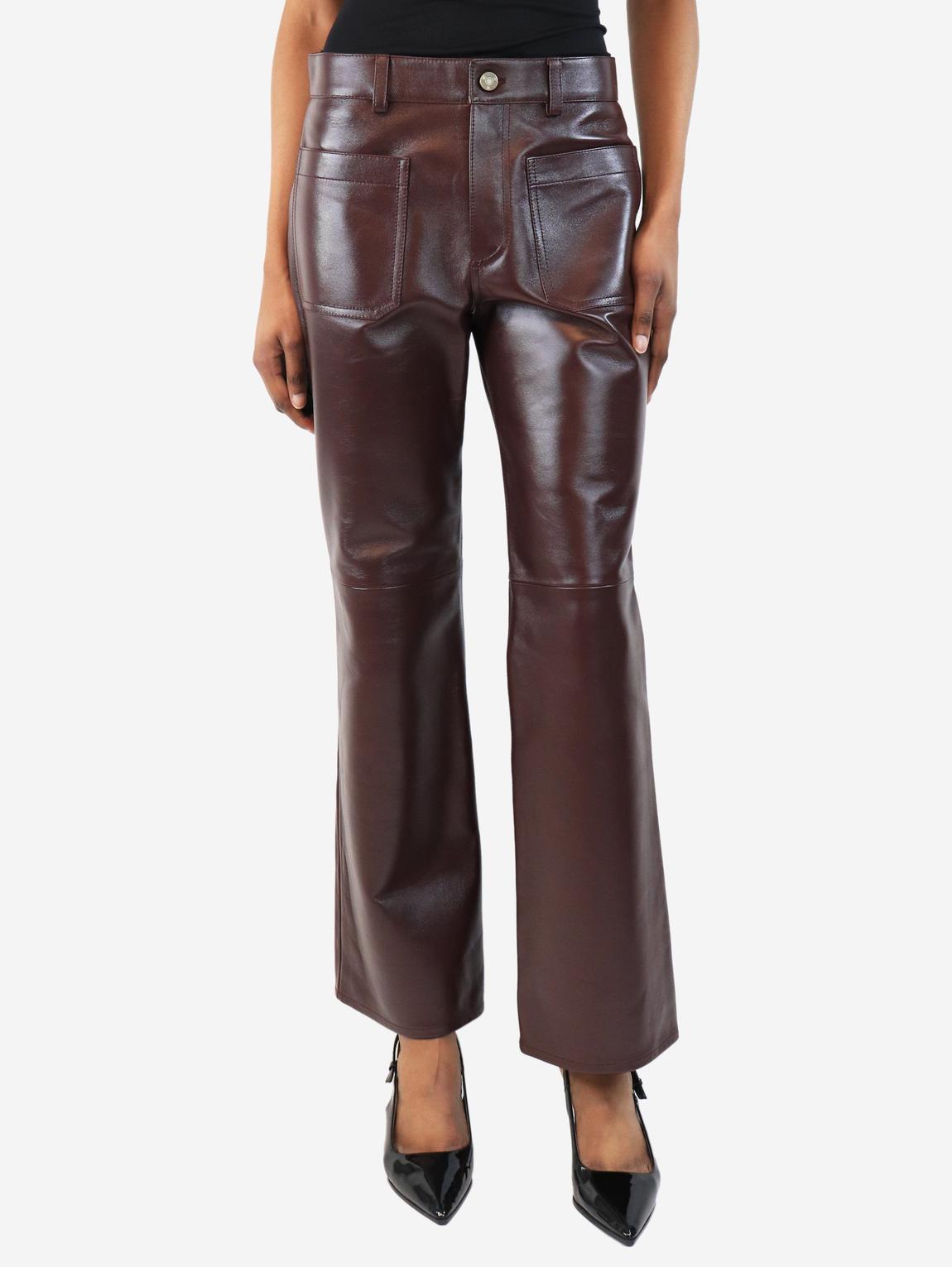 Deep mahogany mid-rise leather flared trousers main product photo
