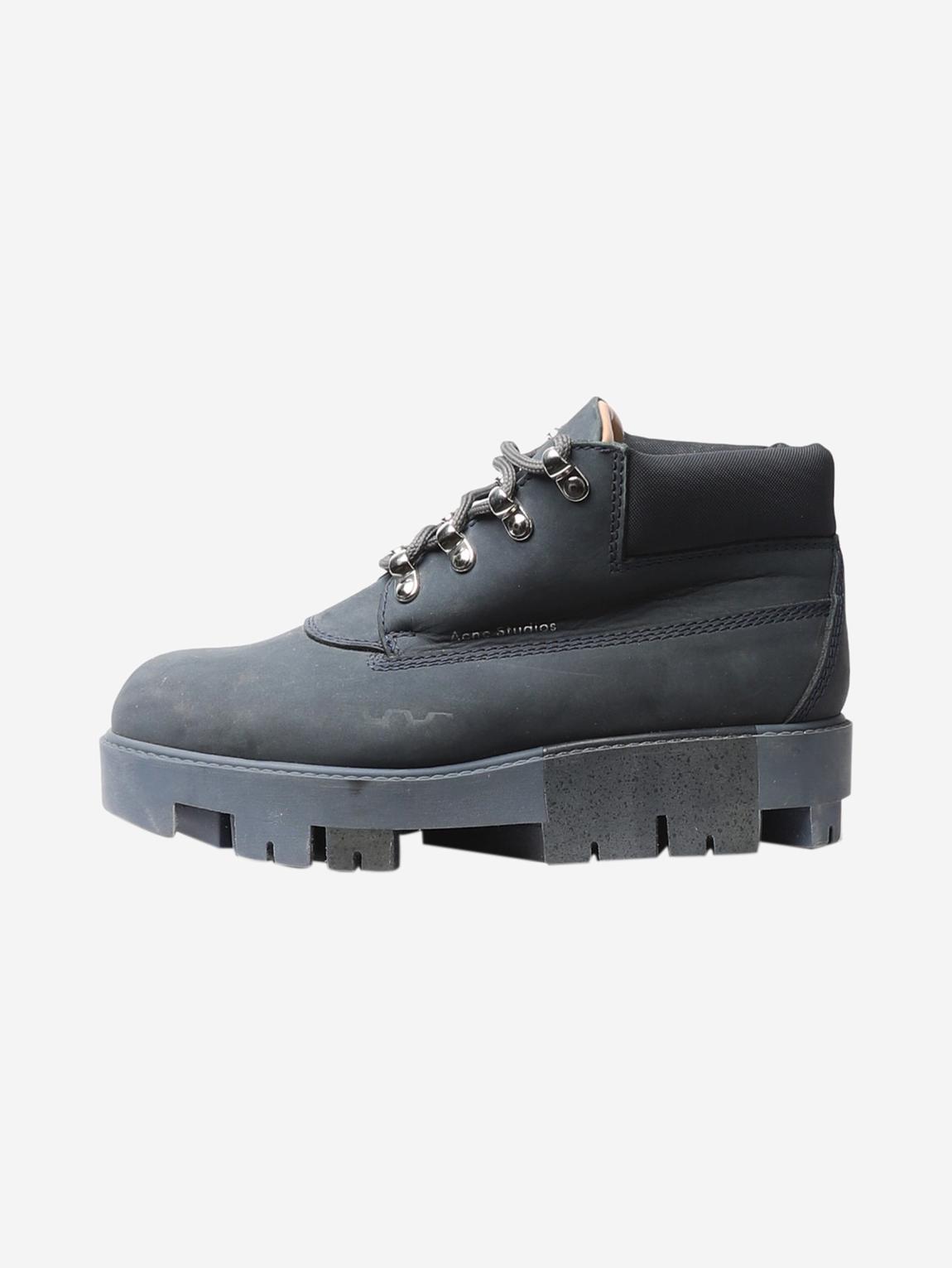 Dark blue hiking boots main product photo