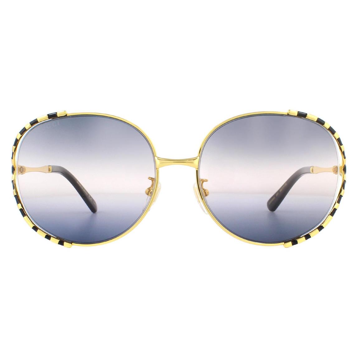 Gucci Sunglasses GG0595S 001 Gold and Black Double Grey Gradient main product photo