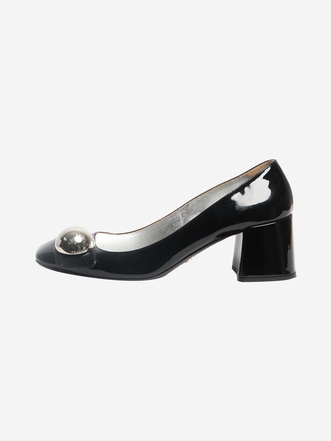 Black patent pumps with silver ball main product photo