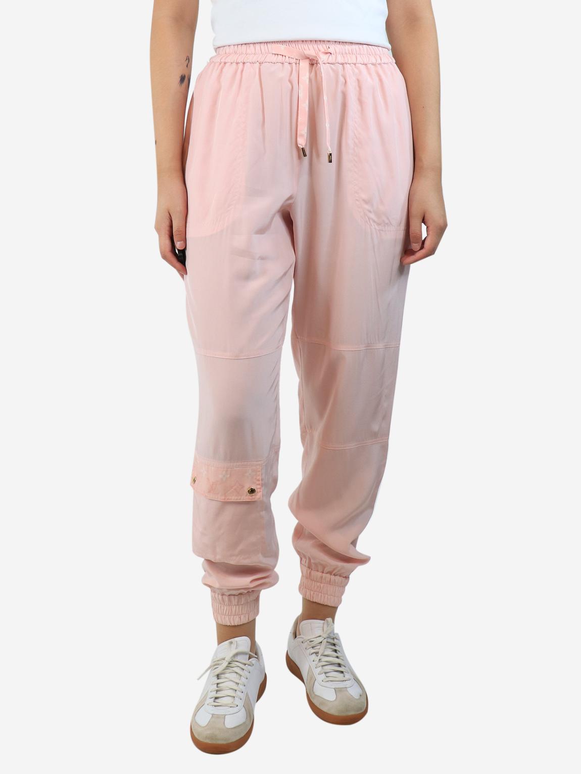 Pink parachute silk trousers main product photo