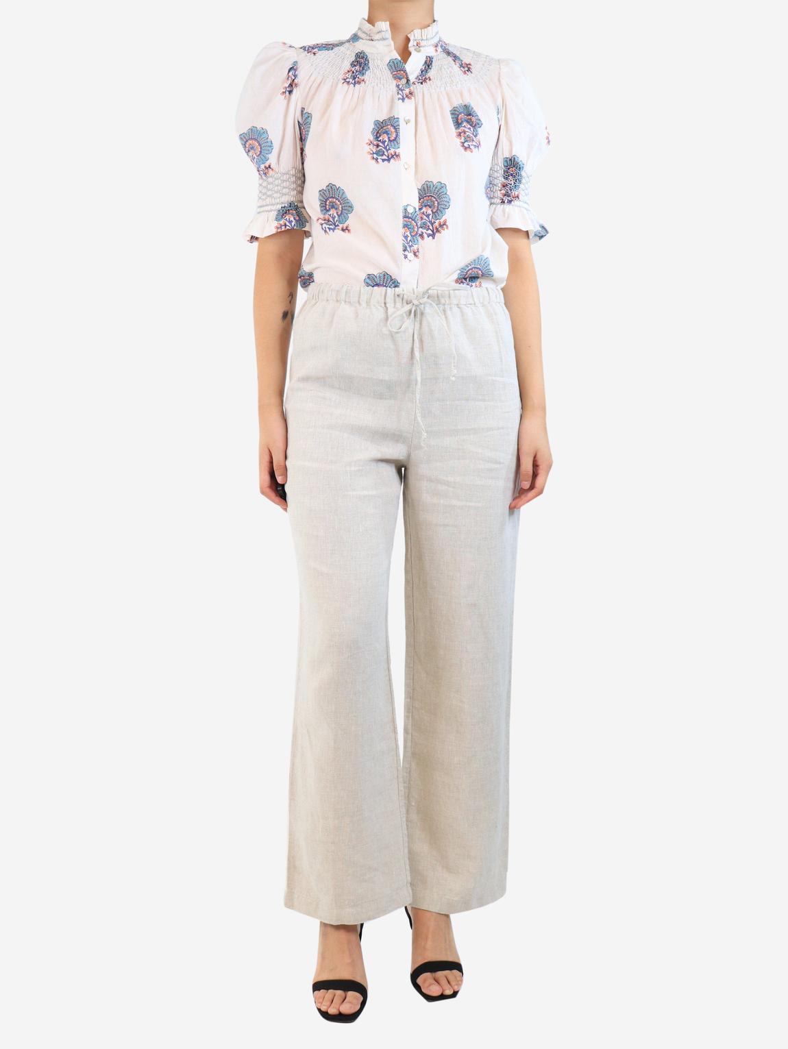 Beige linen trousers main product photo