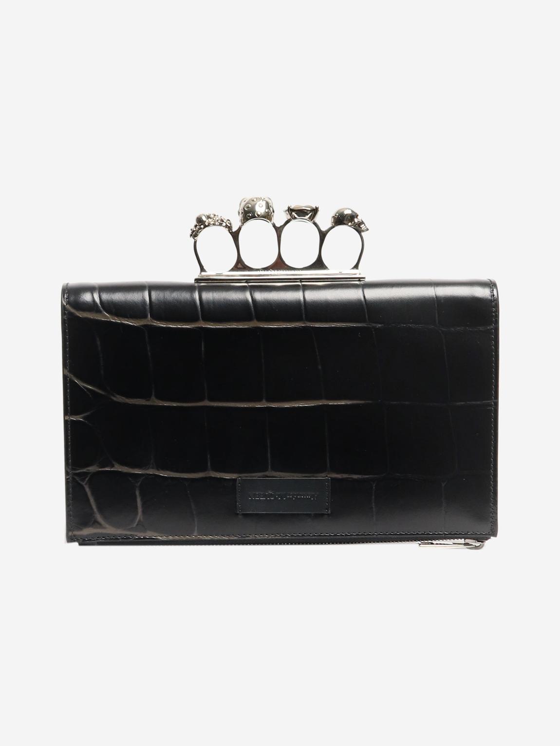 Black croc-embossed leather knuckle-duster clutch main product photo