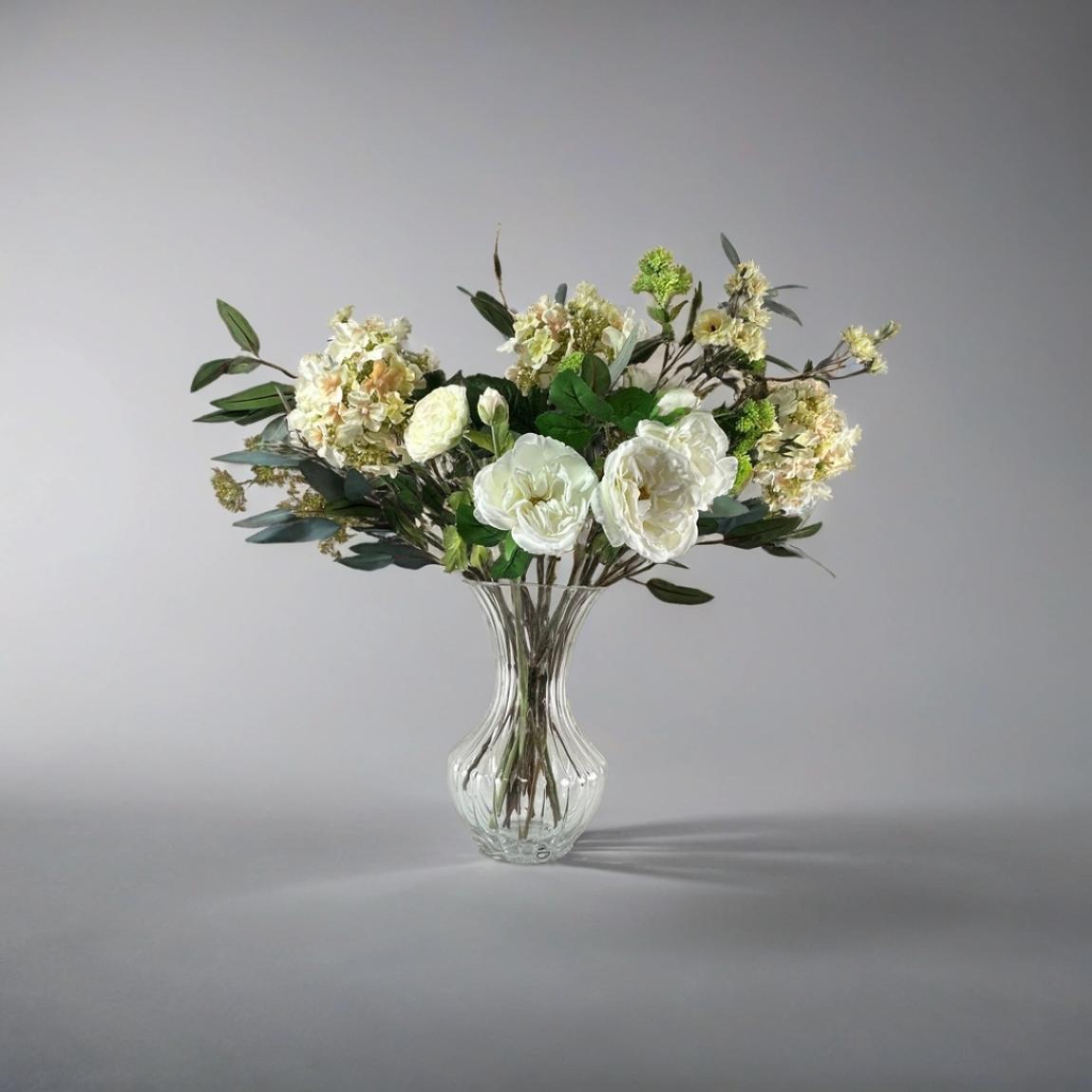 Roses, Paniculata Hydrangeas and Ranunculas in a Grand Waisted Vase main product photo