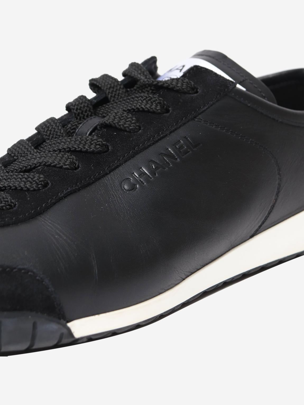 Black leather trainers main product photo