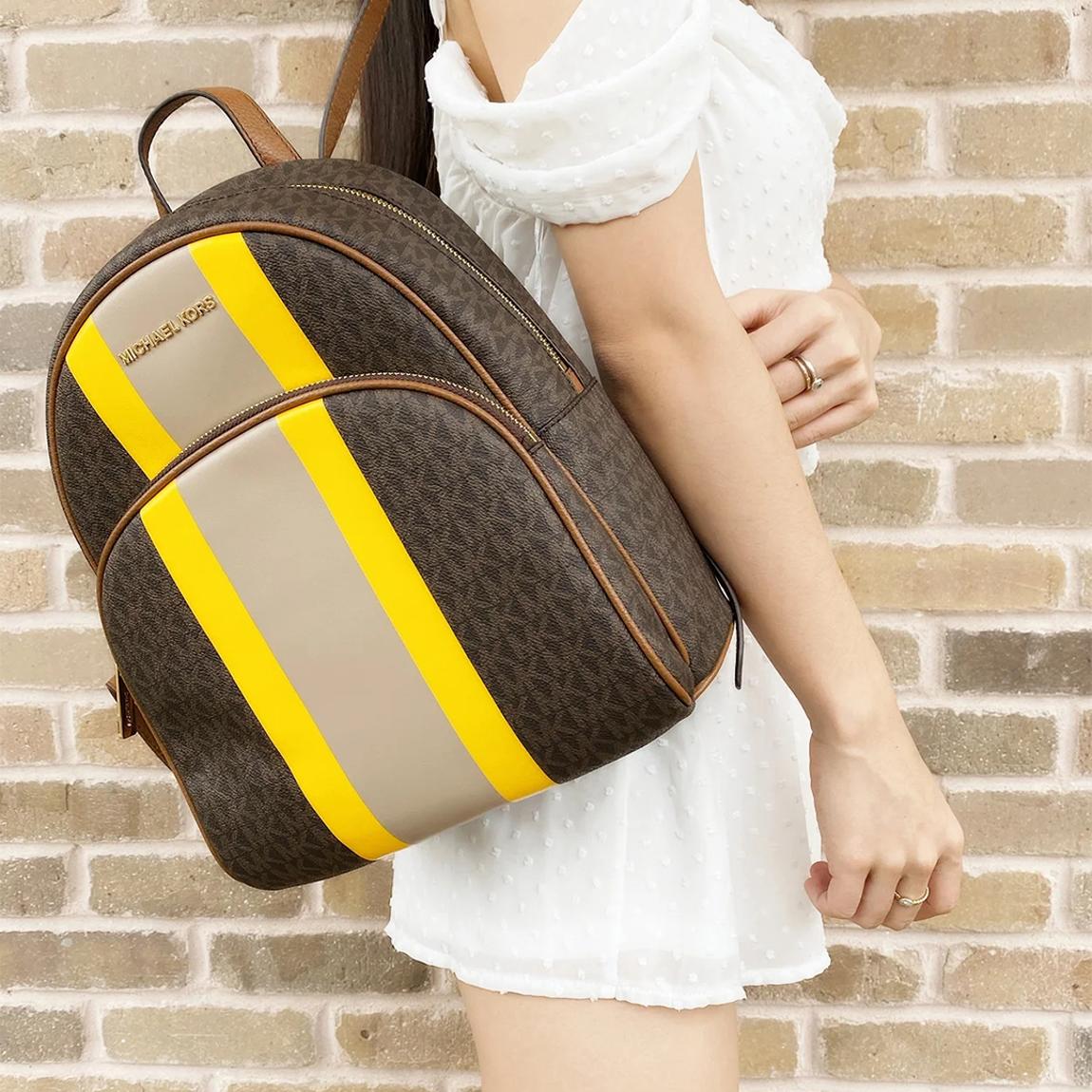 Michael Kors Brown & Yellow Stripe Abbey Pebbled Leather Backpack -  BrandAlley