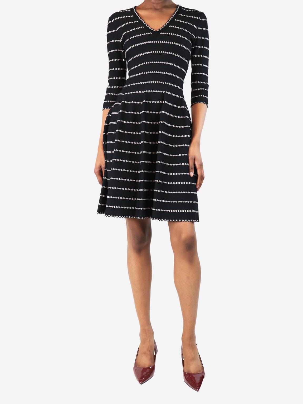 Black and white v-neck mini dress main product photo