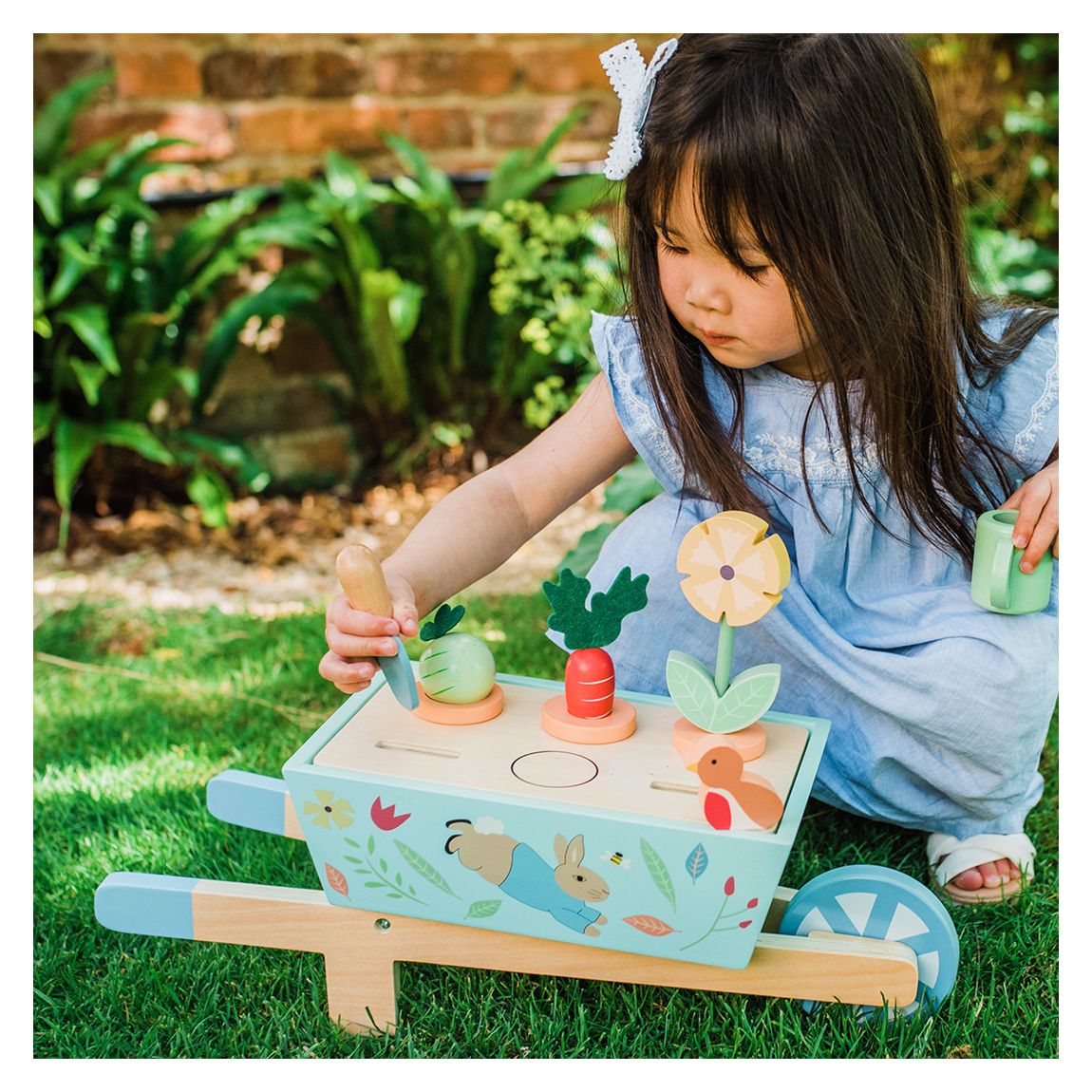 Wooden wheelbarrow toy sales