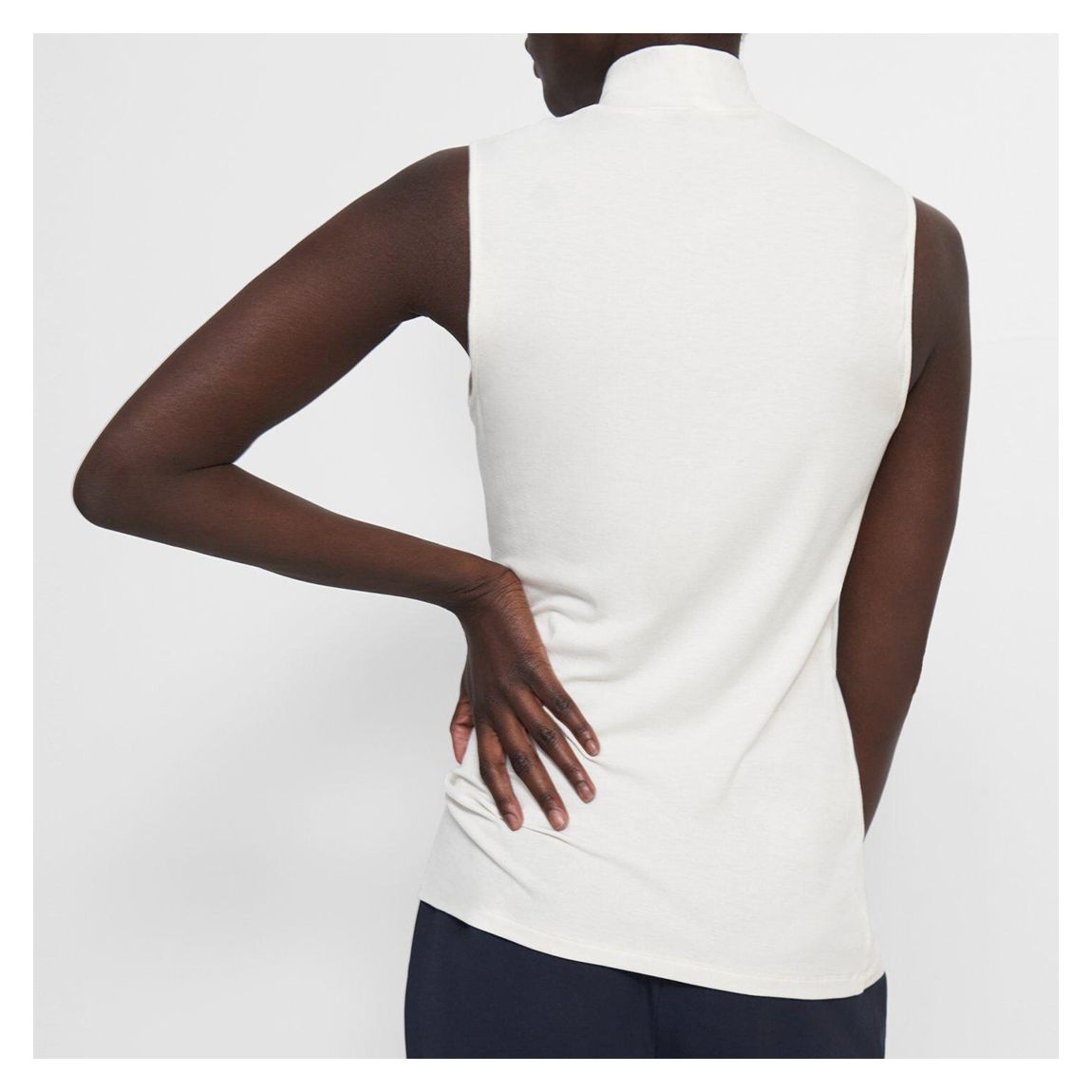 White Turtleneck Sleeveless Top