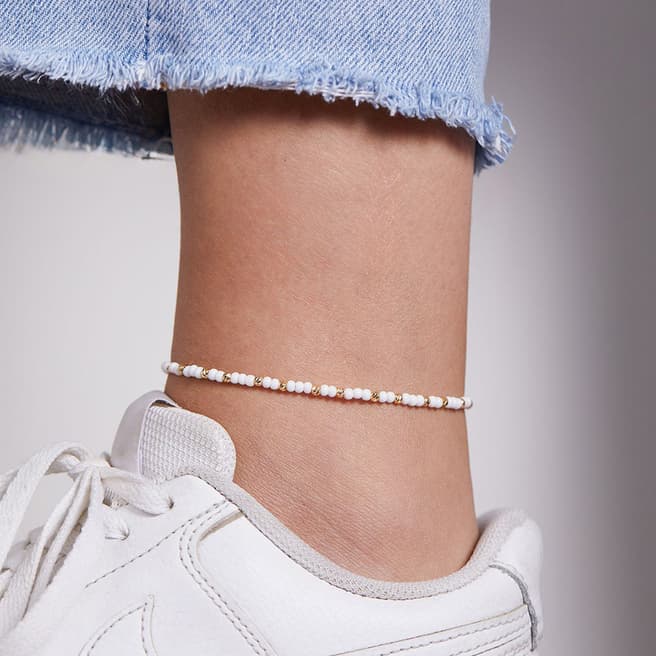 Elika White And Gold Metal Anklet