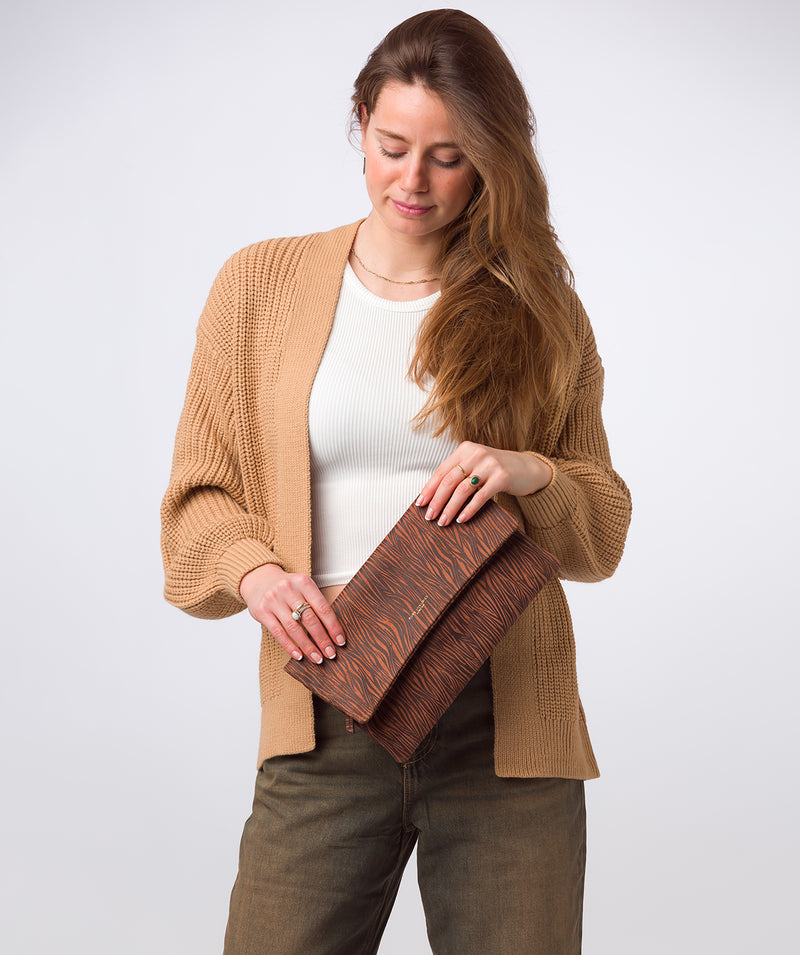 ‘Amelia’ Animal Print Leather Clutch Bag