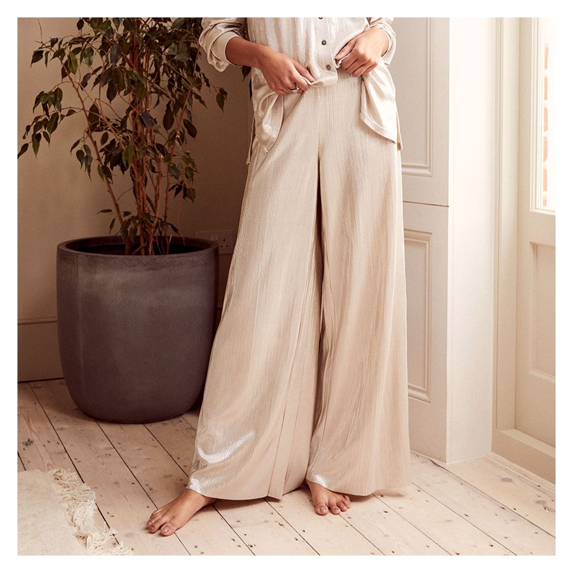 Off White Plisse Wide Leg Trousers main product photo