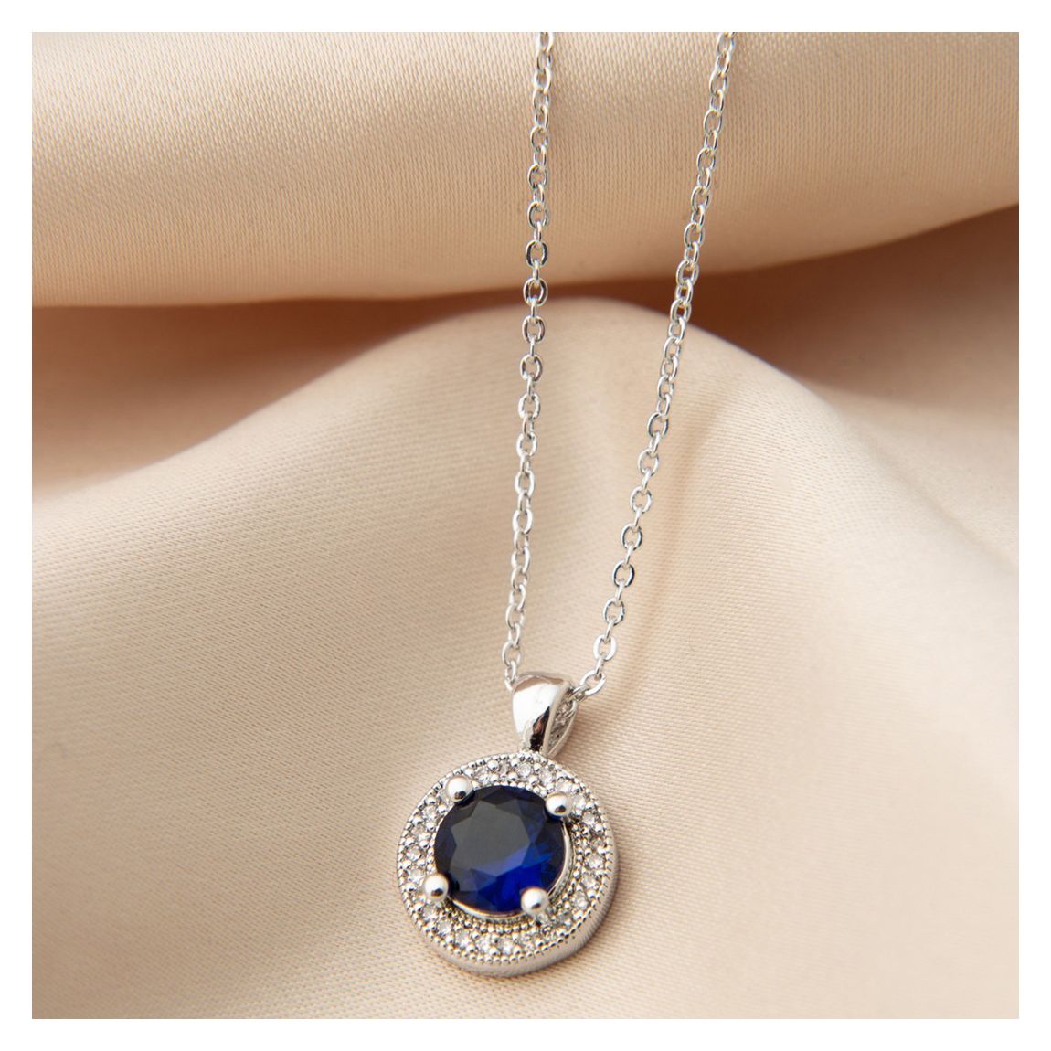Silver/ Sapphire Blue Round Pendant Necklace main product photo
