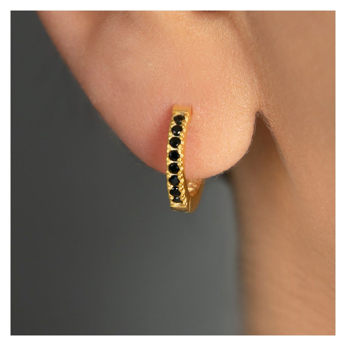 Black & Gold Huggie Earrings main product photo