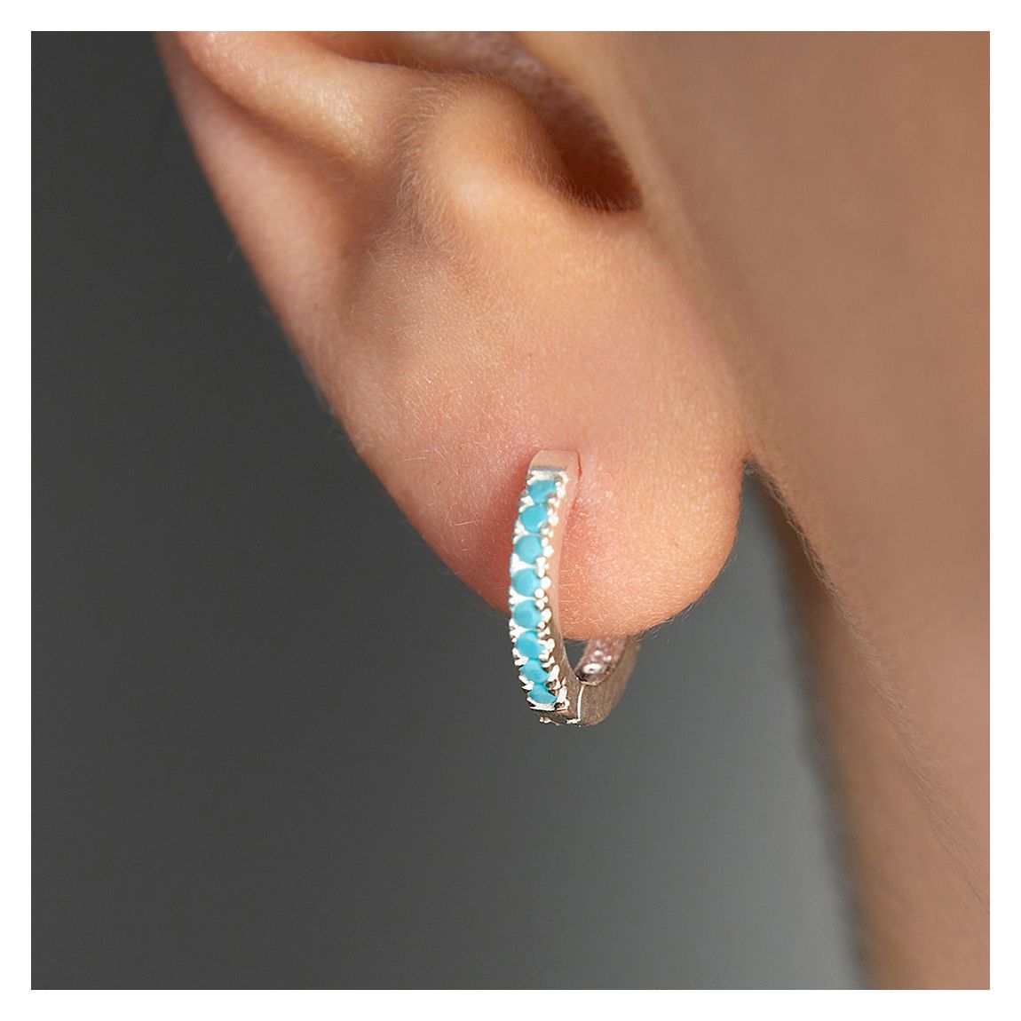 Silver & Blue Huggie Earringss main product photo
