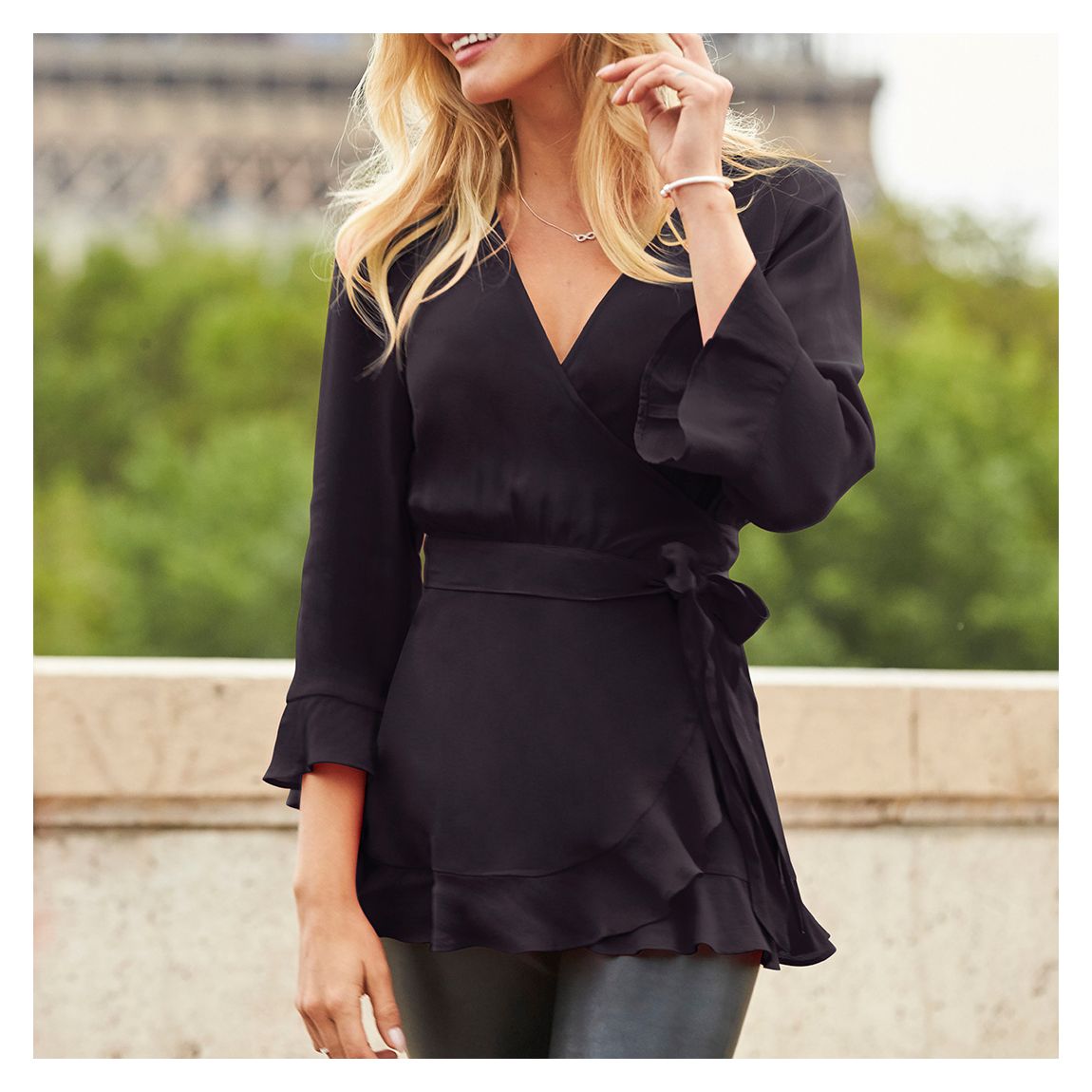 Black Ruffle Hem Fluted Cuff Top main product photo