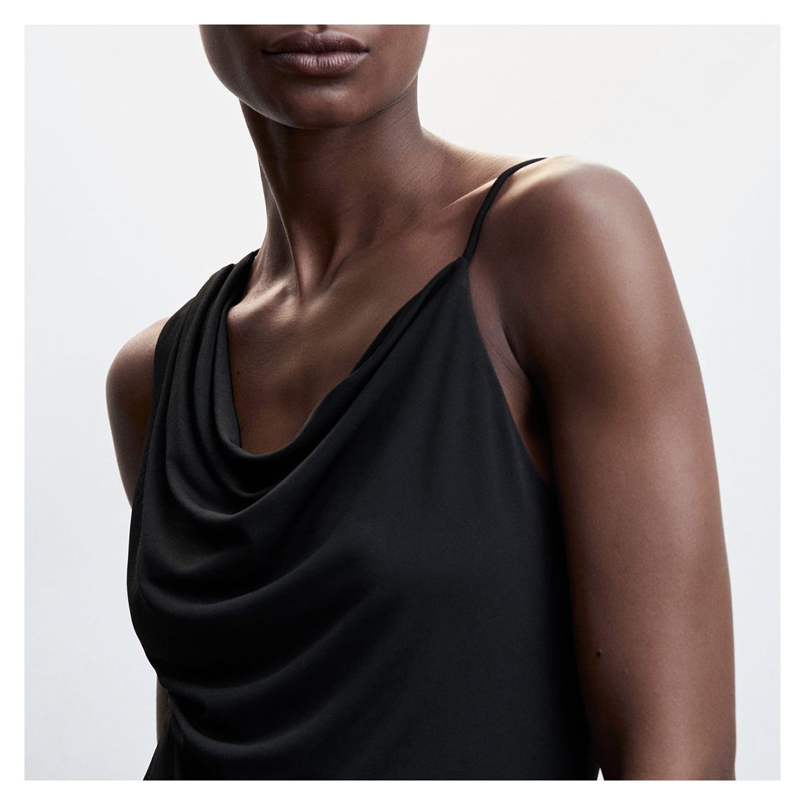 Black Asymmetrical top with draped neckline main product photo