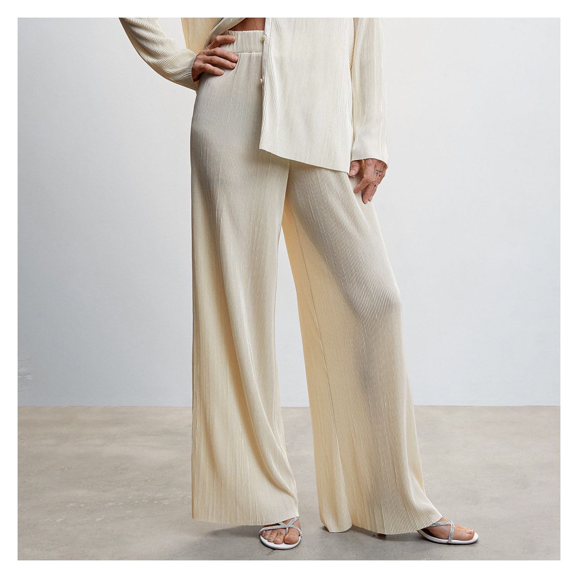 Cream Pleated Palazzo Trousers main product photo