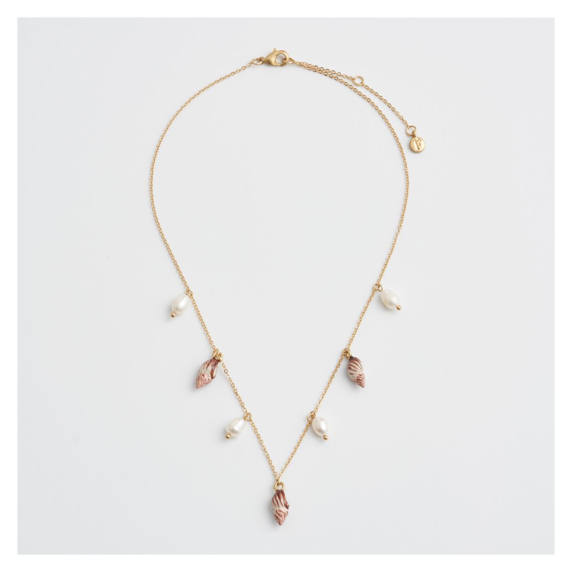 Sea Snail Charm & Pearl Worn Gold Necklace main product photo