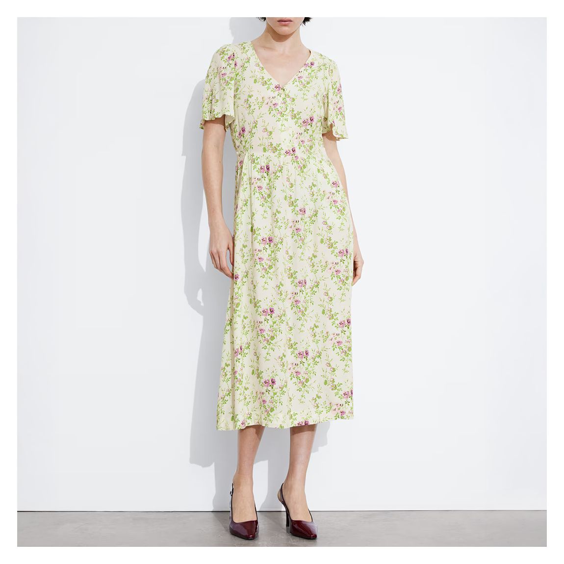 Ivory Printed Flutter Sleeves Midi Dress main product photo