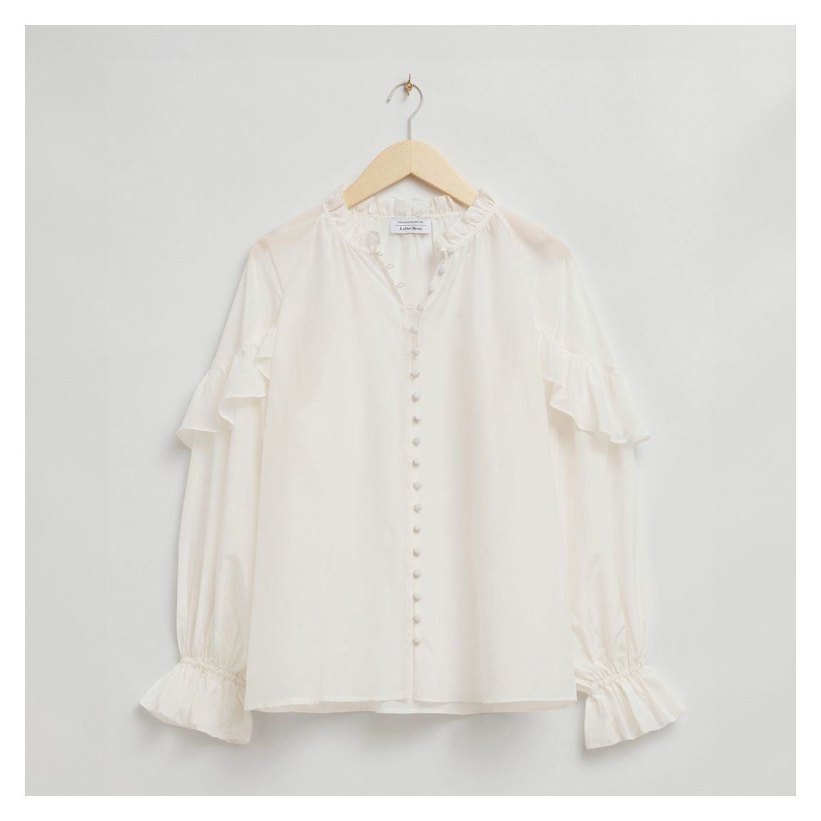 Ivory Ruffle Trim Blouse main product photo