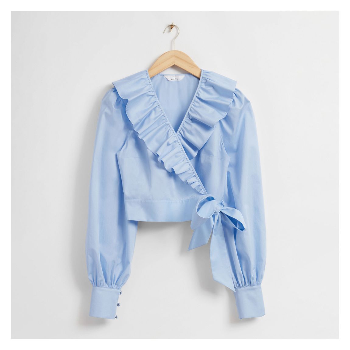 Light Blue Ruffled Wrap Blouse main product photo