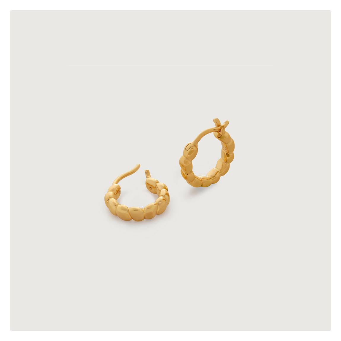 Gold Nura Teardrop Huggie Earrings main product photo