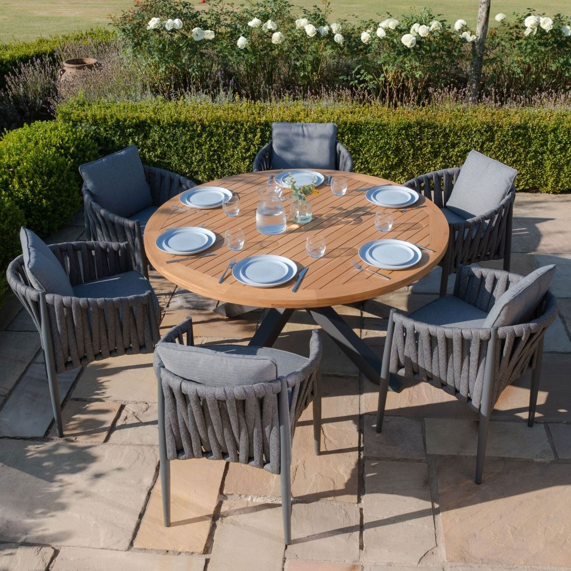 Jakarta Teak Round Dining Table With Milan Dining Chairs - Charcoal main product photo