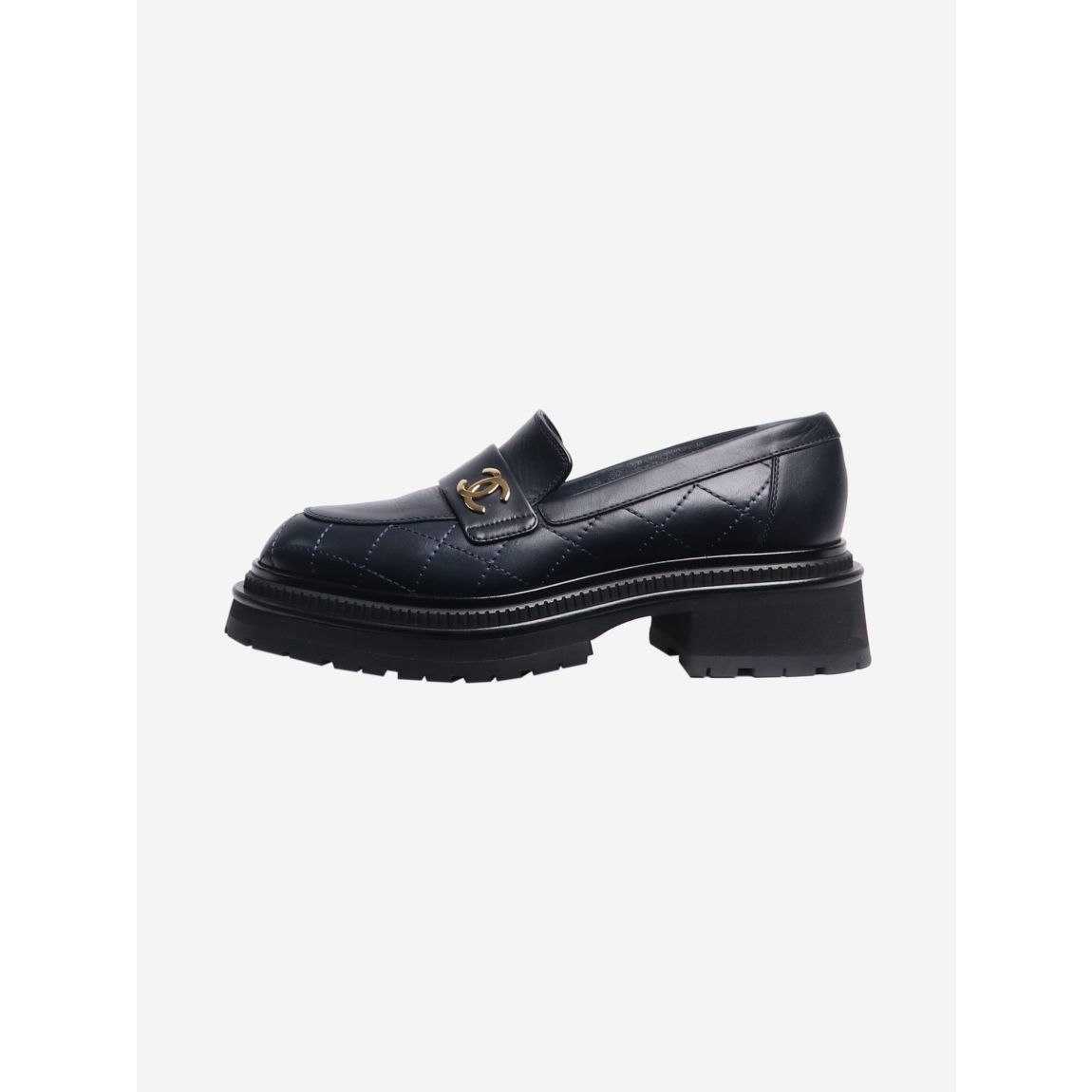 Dark blue chunky quilted leather loafers main product photo
