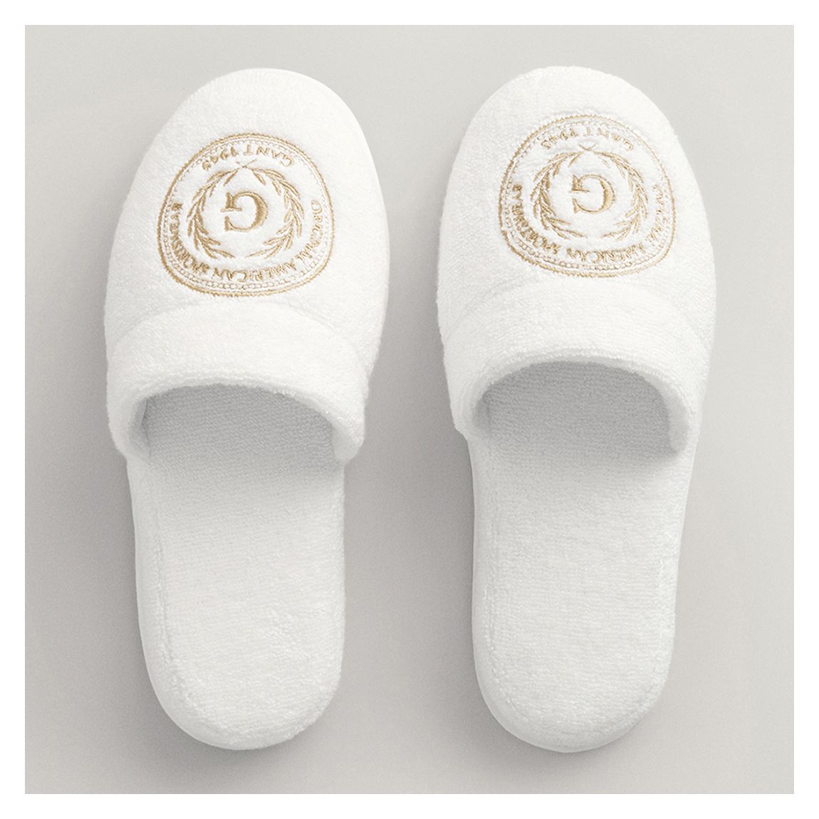 White Embroidered Crest Slippers main product photo