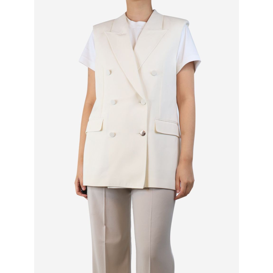 Cream sleeveless double-breasted jacket main product photo