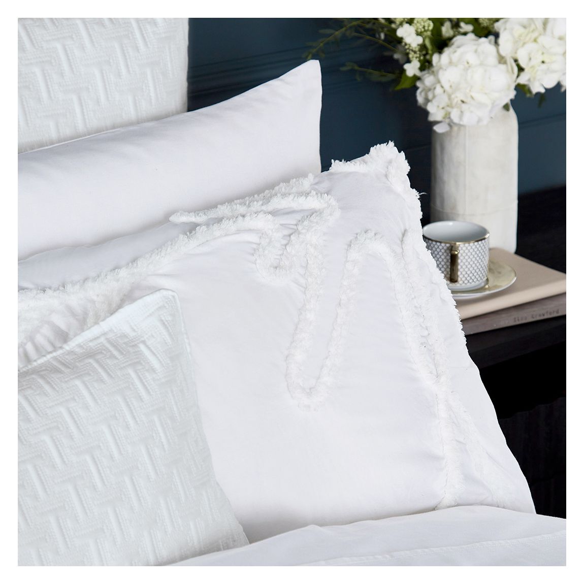 Magnolia Tufted Standard Pillowcase, White main product photo