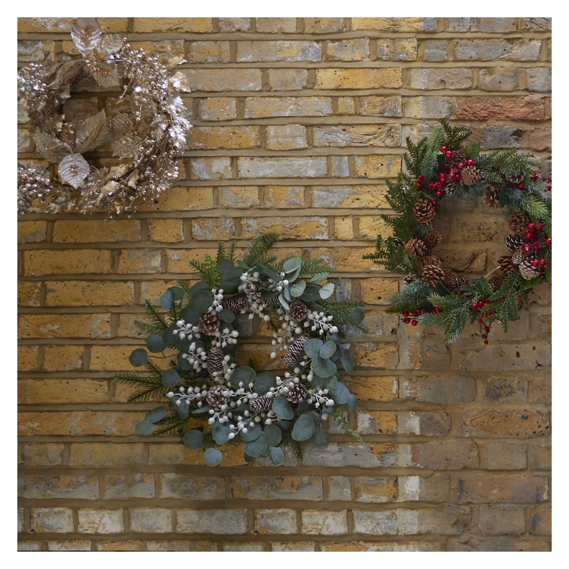 Fir/Leaf Wreath with Snowy Cones/Red Berries, 54cm main product photo